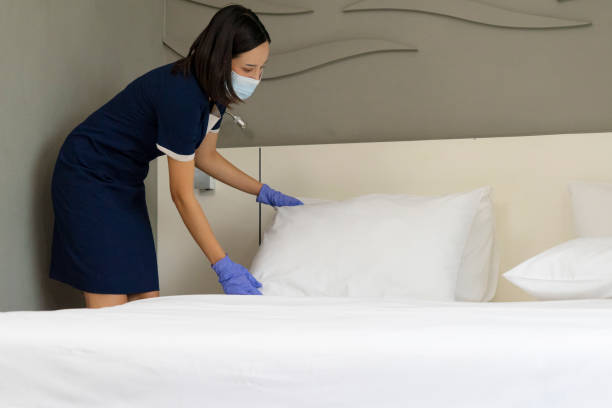istock Hotel's staffs are cleaning the room 1312253244