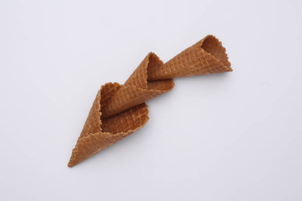 istock Ice cream waffle cones on white background. Top view 1312253705
