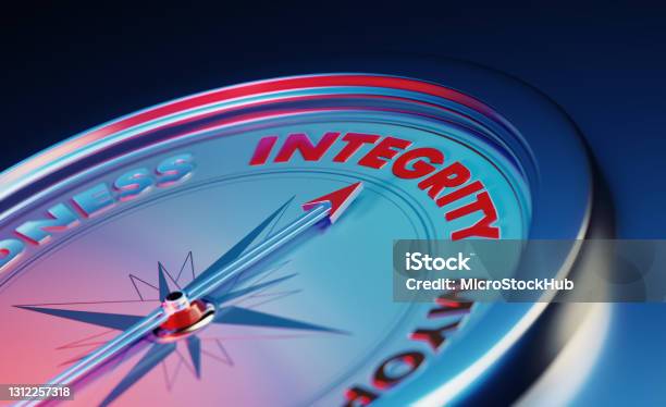 Integrity Concept The Arrow Of The Compass Pointing The Integrity Word Over Dark Blue Metallic Background Stock Photo - Download Image Now