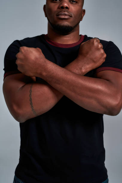 istock Muscular african american man with hands crossed 1312257343