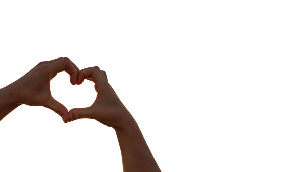 istock Heart shape forming with fingers 1312258829