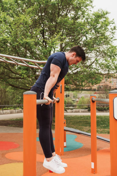 istock Young man exercising outdoors 1312261357