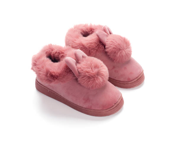 istock Pink fluffy shoes isolated on white background 1312264974