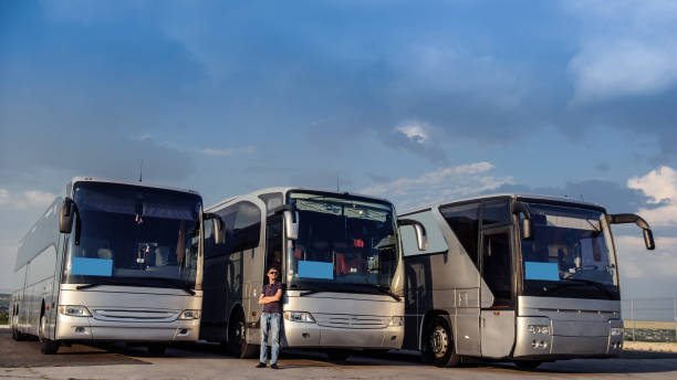 istock Three buses staying in the parking lot Front Way 1312265379