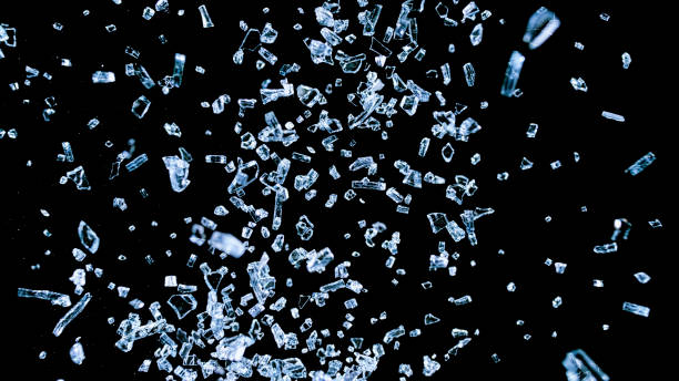istock Close-up of falling glass shards 1312266344