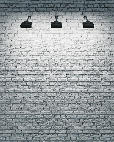 white brick wall with three spotlights illuminating. 3d rendering
