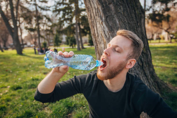 istock Man on  water break after exercising 1312268466