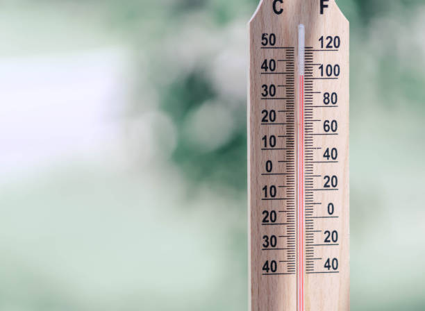 istock Close up hand holding thermometer with hot temperature 1312268514