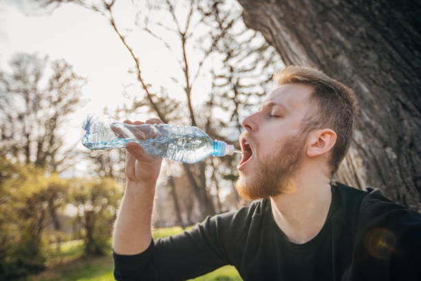 istock Man on  water break after exercising 1312268623
