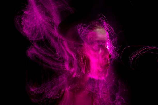 istock lightpainting portrait, long exposure 1312269376
