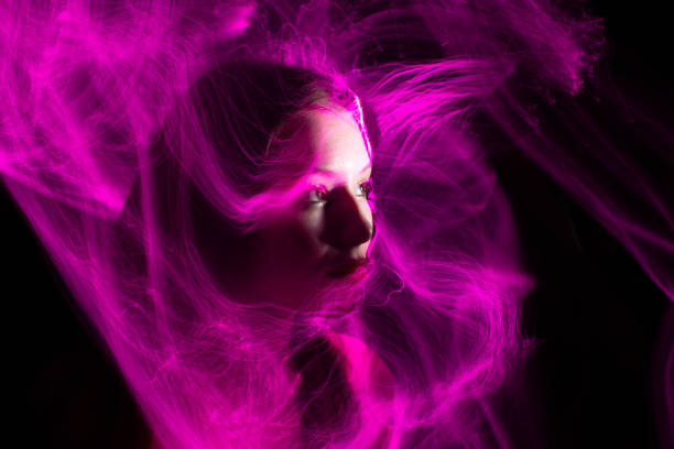 istock lightpainting portrait, long exposure 1312269378