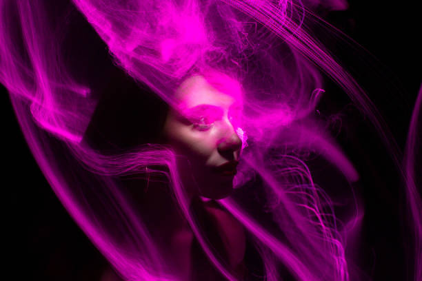 istock lightpainting portrait, long exposure 1312269393