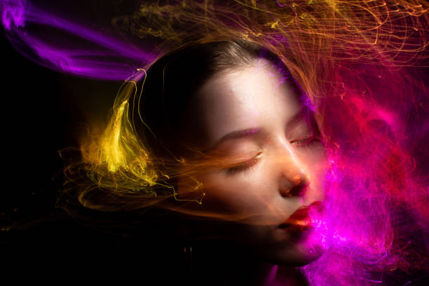 istock lightpainting portrait, long exposure 1312269424