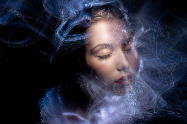 istock lightpainting portrait, long exposure 1312269451