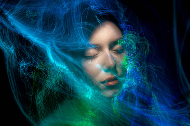 istock lightpainting portrait, long exposure 1312269452