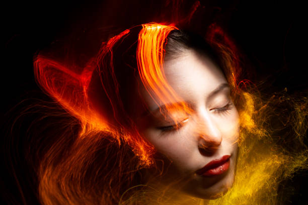 istock lightpainting portrait, long exposure 1312269453