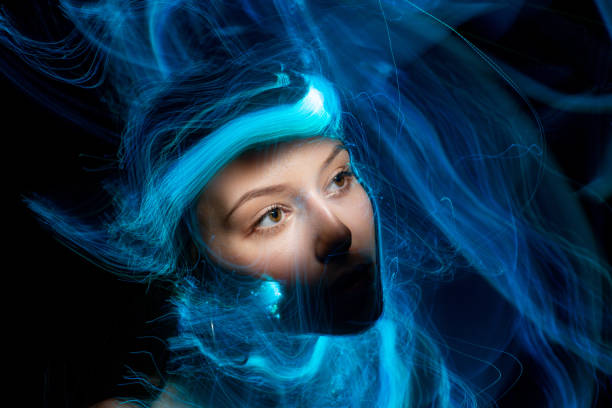 istock lightpainting portrait, long exposure 1312269531