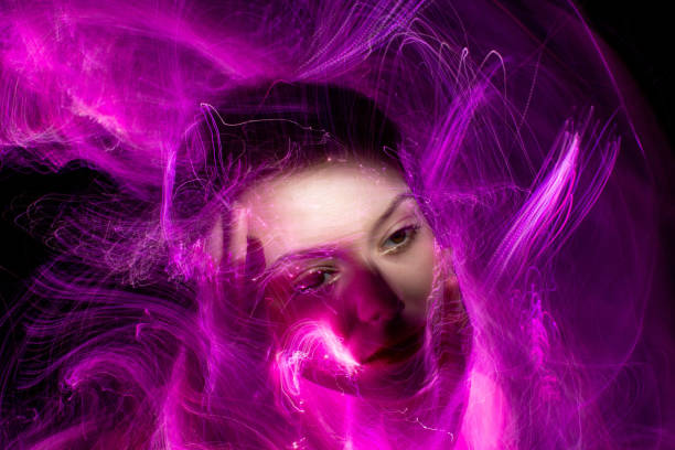 istock lightpainting portrait, long exposure 1312269636