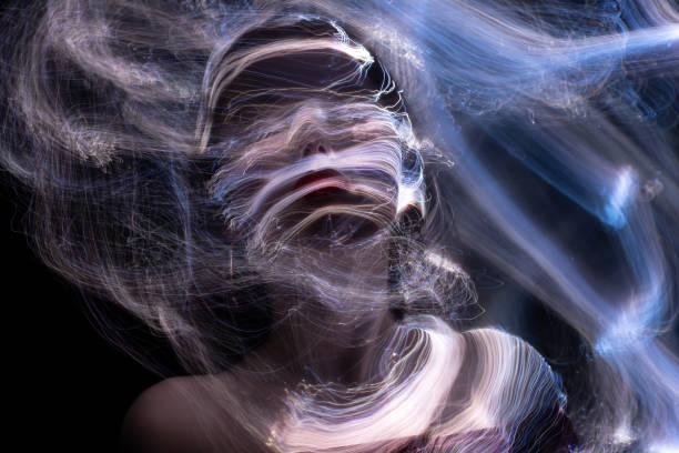 istock lightpainting portrait, long exposure 1312269640