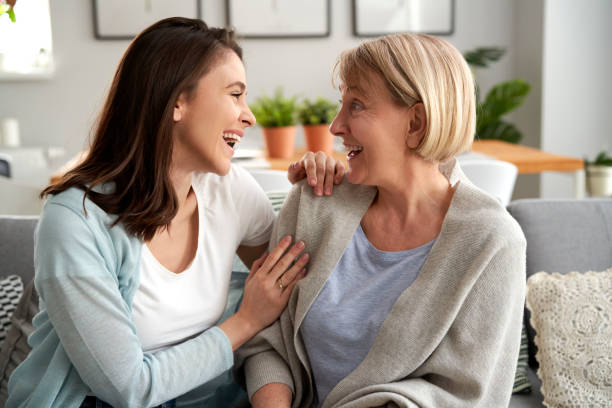 istock Two generation women laughing together 1312271987