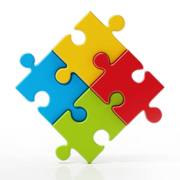 istock Four colored fitting puzzle pieces isolated on white 1312272267