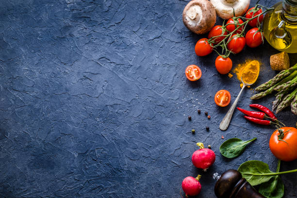 istock Healthy cooking with copy space on a bluish background 1312273376