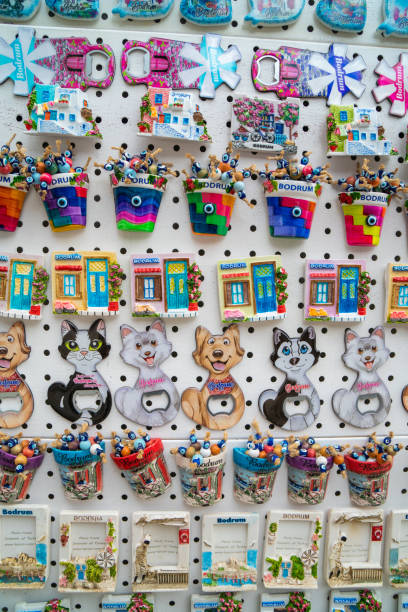 istock Turkey, Bodrum.Ceramic greek mill souvenirs on the shop window. 1312273570