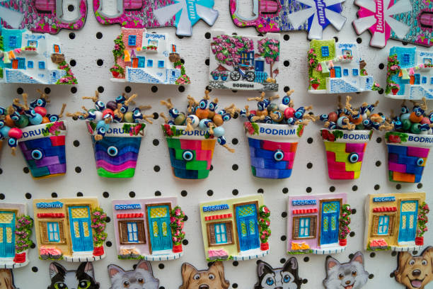 istock Turkey, Bodrum.Ceramic greek mill souvenirs on the shop window. 1312273596