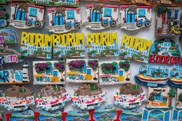 istock Turkey, Bodrum.Ceramic greek mill souvenirs on the shop window. 1312273638