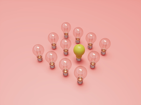 Pear shaped light bulb between the typical light bulbs.  (3d render)