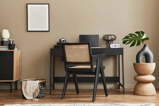 Photo of Stylish composition of home office interior and elegant office accessories. Template.