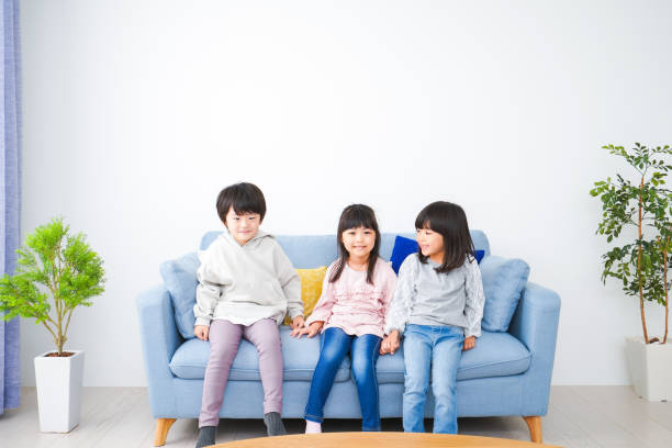 istock Children having fun playing in their room 1312283573