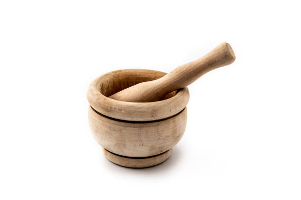 istock Wooden mortar and pestle 1312283593