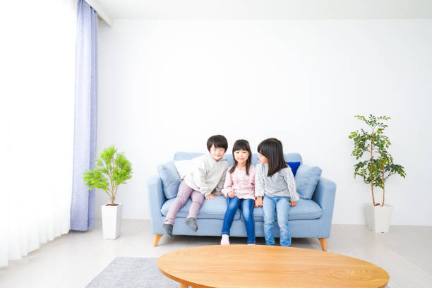 istock Children having fun playing in their room 1312283621