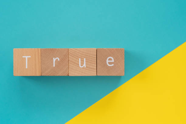 istock True; Four wooden blocks with 