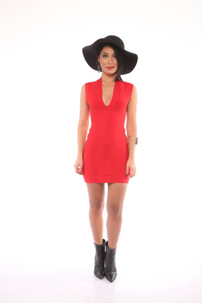 istock woman in red dress 1312288252