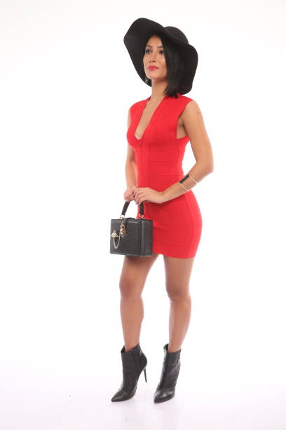 istock woman in red dress 1312288304