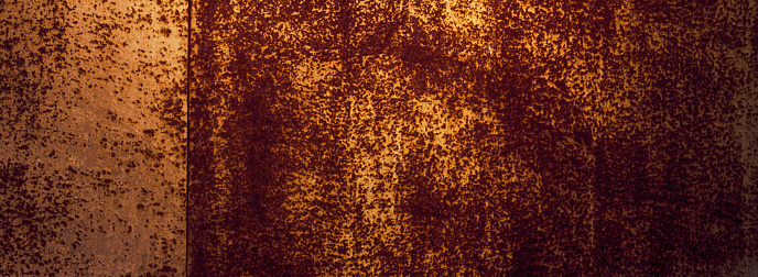 Empty rusty corrosion and oxidized background, horizontal banner. Grunge rusted metal texture. Worn metallic iron wall