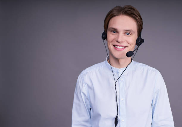 Young handsome caucasian man with a headset. stock photo
