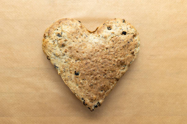istock Big baked heart lies on baking paper 1312291710