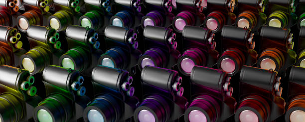 istock Colorful reflective cameras lined up in row. Creative concept on black background 3d render 1312291894