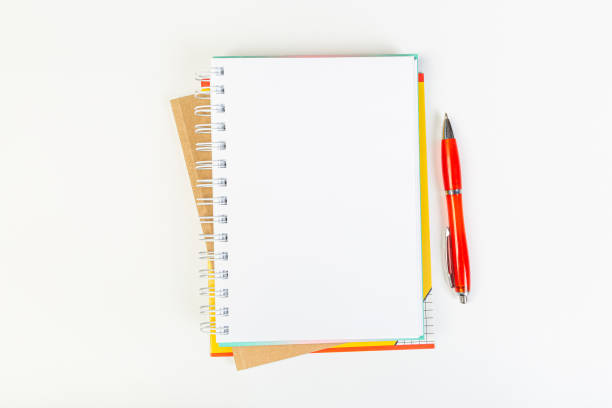 istock top view of open notebook with pen on gray background, school notebooks with coil spring, office notebook flat lay 1312292746