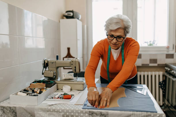 istock Senior woman sewing blouse from scratch 1312294542