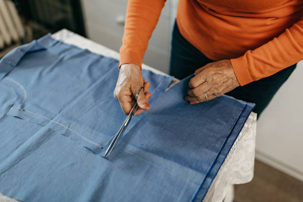 istock Senior woman sewing blouse from scratch 1312294633