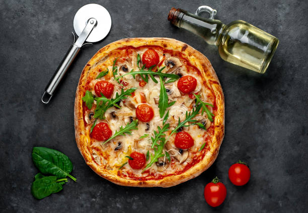 istock delicious homemade pizza on a stone background 1312299621