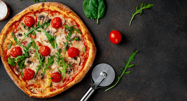 istock delicious homemade pizza on stone background with copy space for your text 1312299698