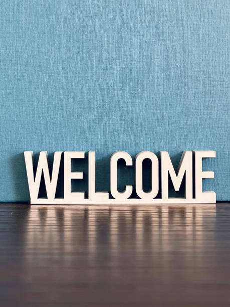 istock Welcome sign on blue background 1312299755