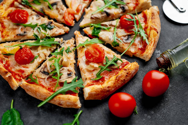 istock delicious homemade pizza on a stone background 1312299766