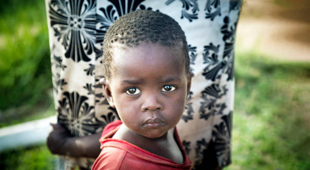 istock Small kid in an African village 1312299790