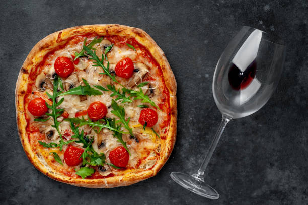 istock delicious homemade pizza on a stone background 1312299816